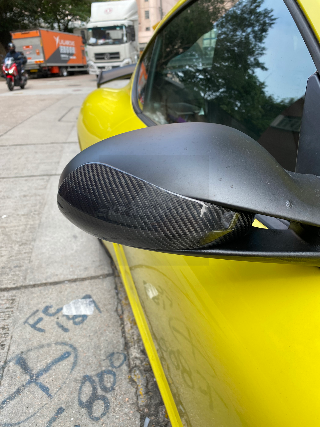 Carbon Fiber Mirror Cover installed on a 987 Cayman